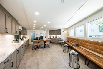 A modern office space with wooden floors and furniture.at 3TEN, Springfield